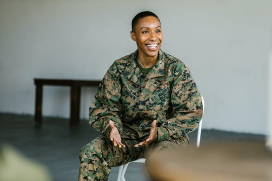 Smiling Marine Sitting