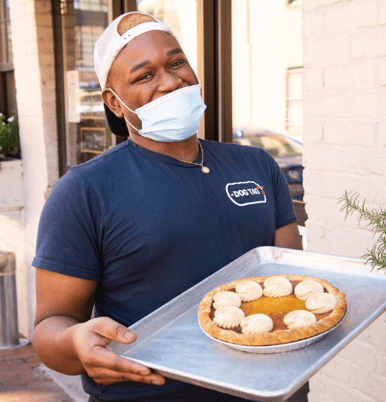Worker with pie